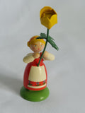 Dregeno bloemenmeisje met boterbloem